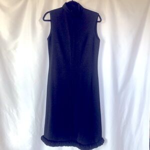 CARON black vintage sleeveless long dress. Size 12. Yarn ruffle at bottom.